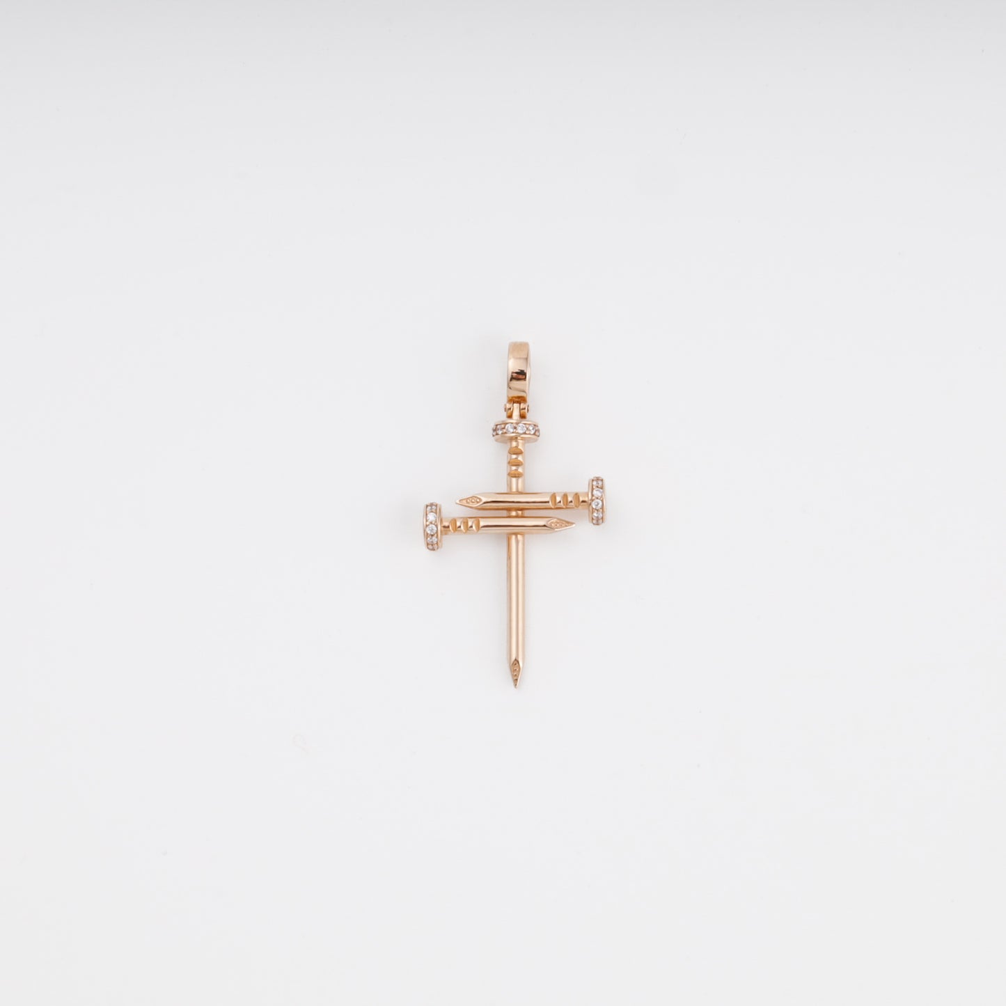 Nail cross pendant in 14K rose gold with pavé zirconia accents — Kabluchka Jewelry Store