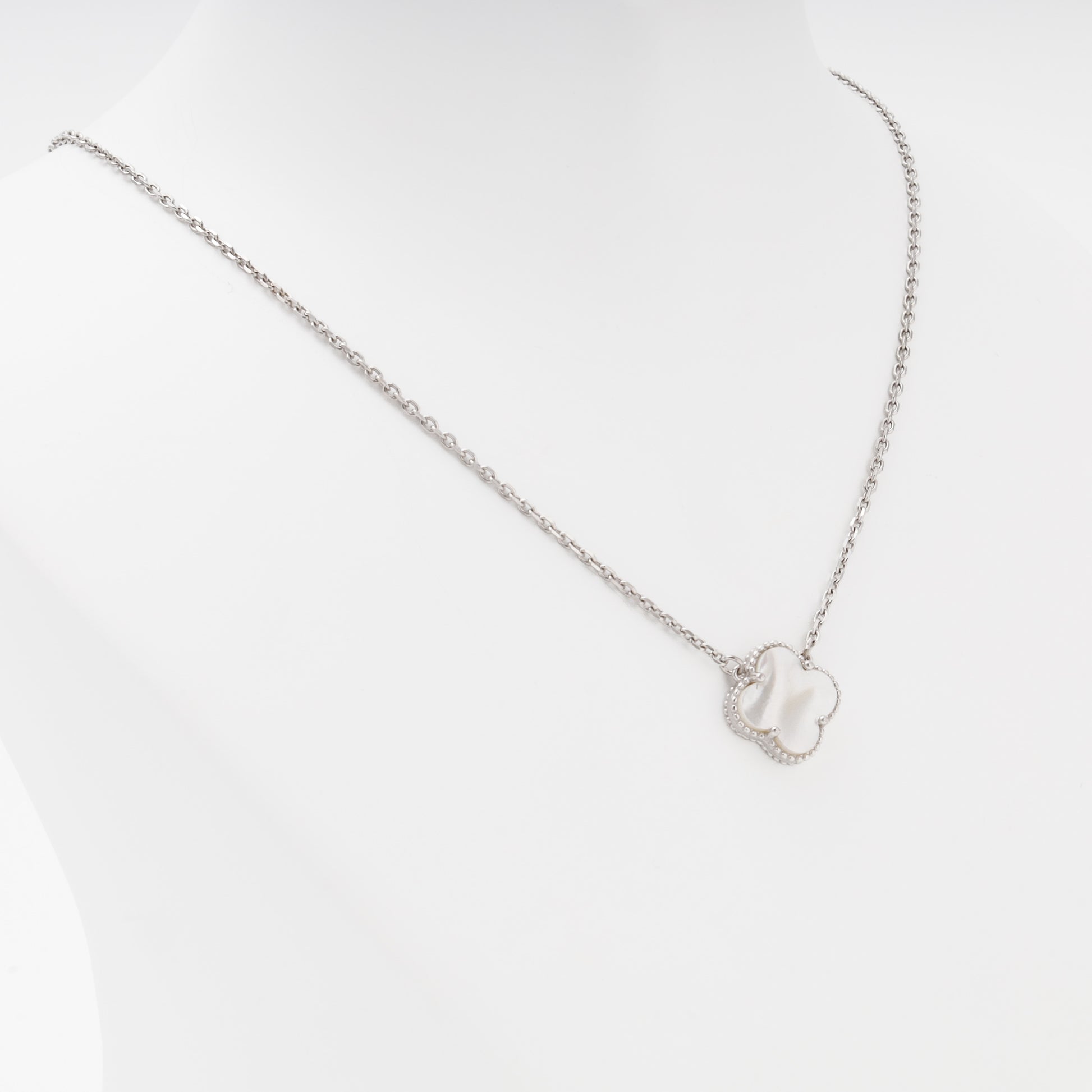 Silver clover pendant necklace close up angled — Kabluchka
