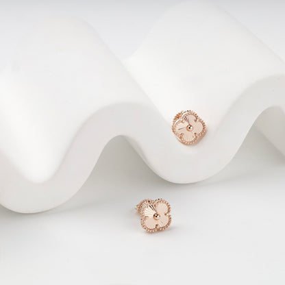 Rose gold 585 four-leaf clover earrings, angled front view