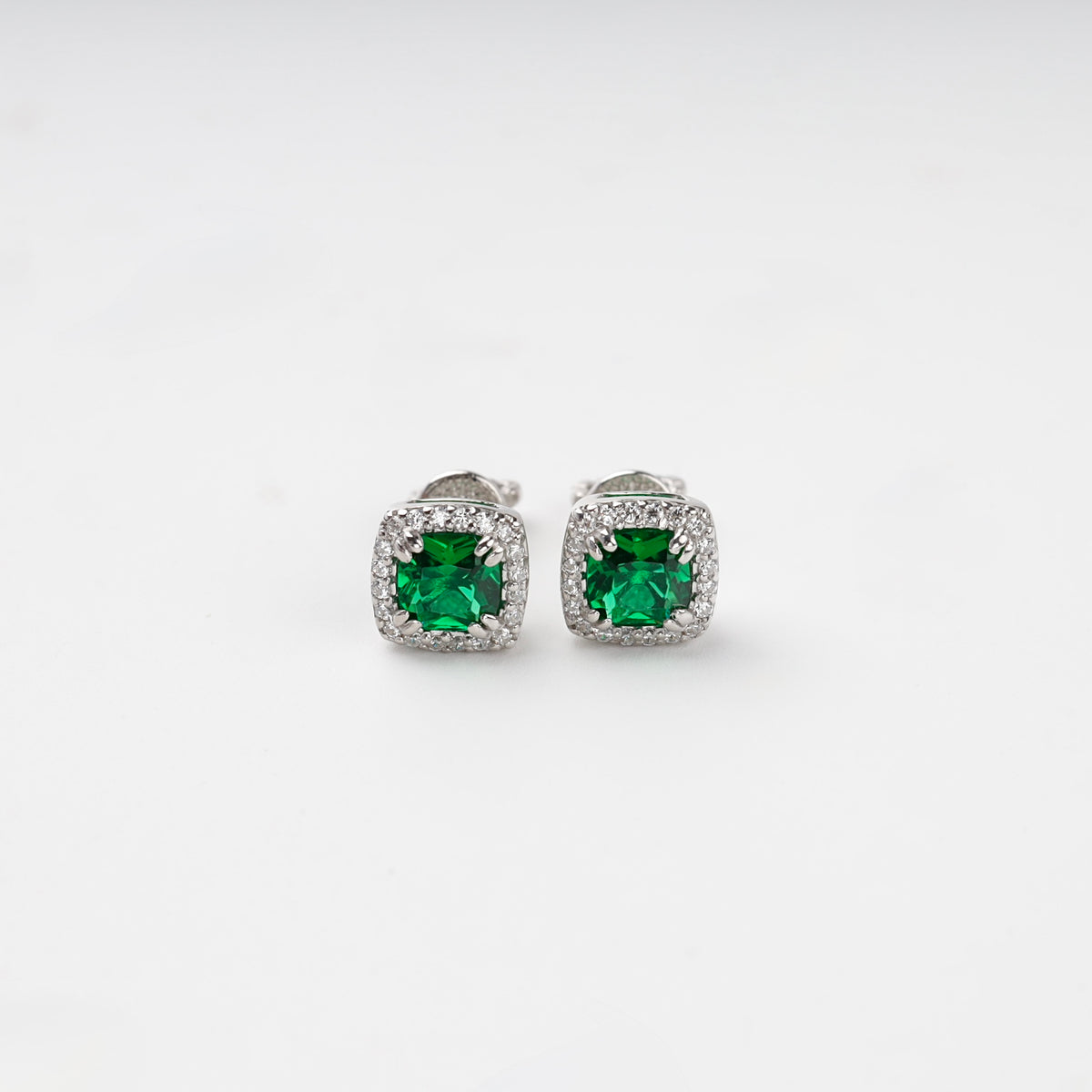 Silver 925 green cubic zirconia halo stud earrings, front view