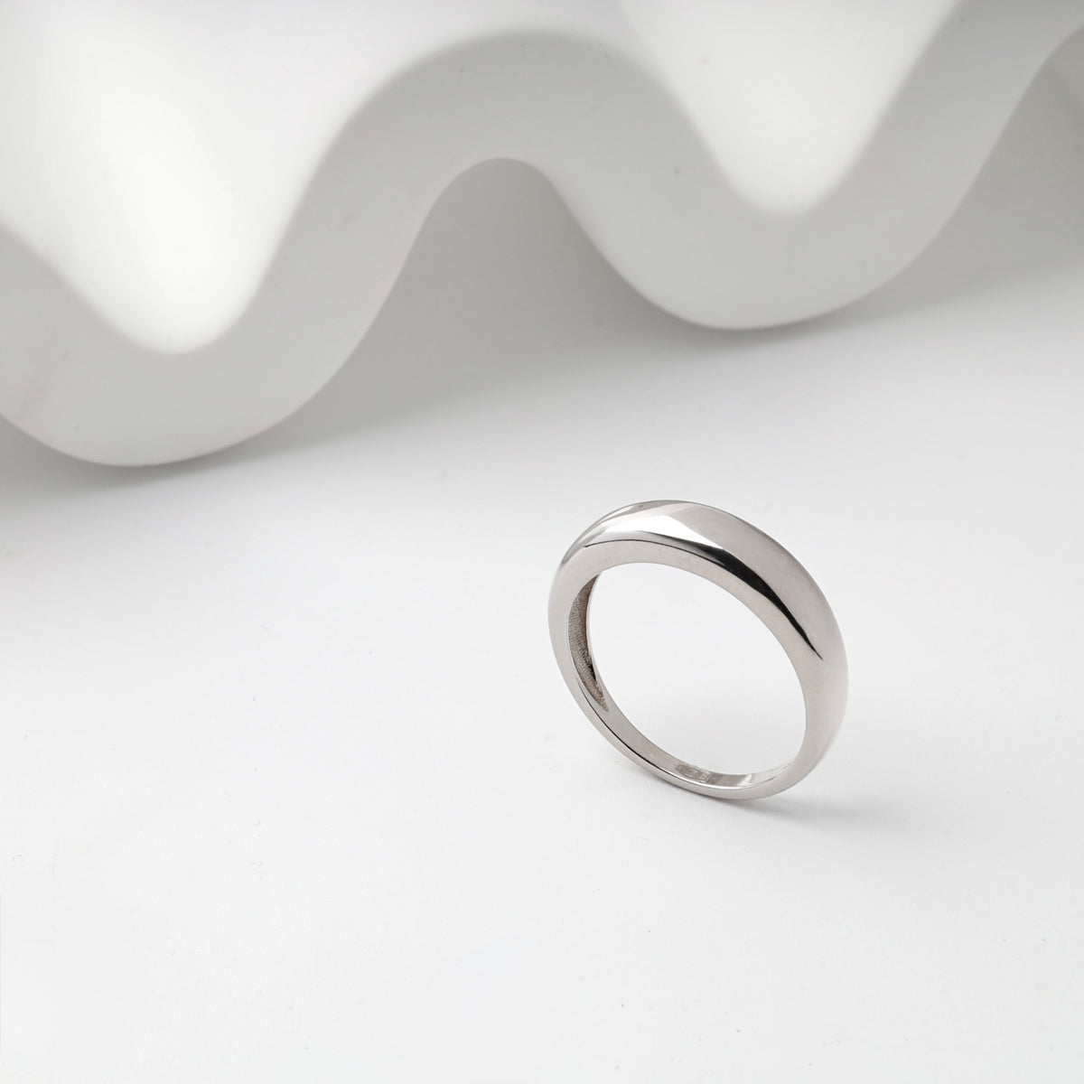 Rhodium-plated silver 925 band ring — angled view — Kabluchka