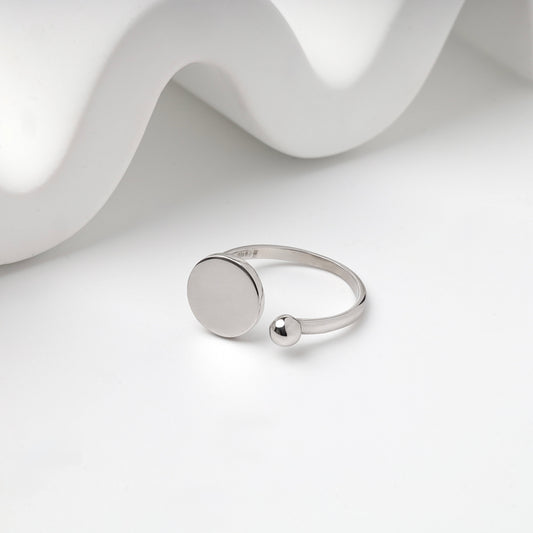 Silver 925 open disc and ball ring — angled view — Kabluchka