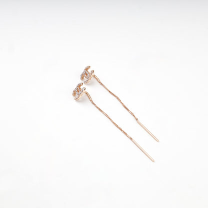 Rose gold 585 clear-stone threader earrings — angled view — Kabluchka