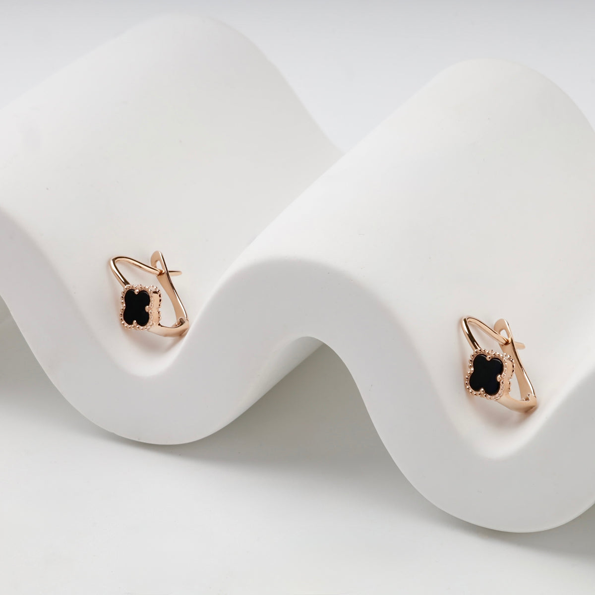 Rose gold 585 black onyx clover kids earrings, pair view