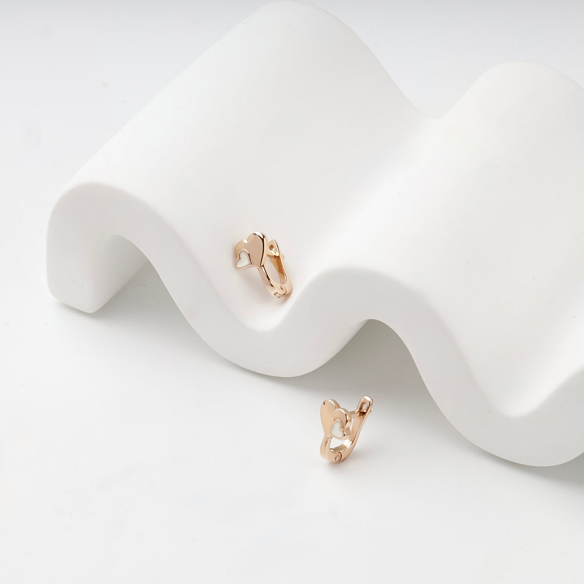 Rose Gold 14K white enamel heart kids earrings, side view