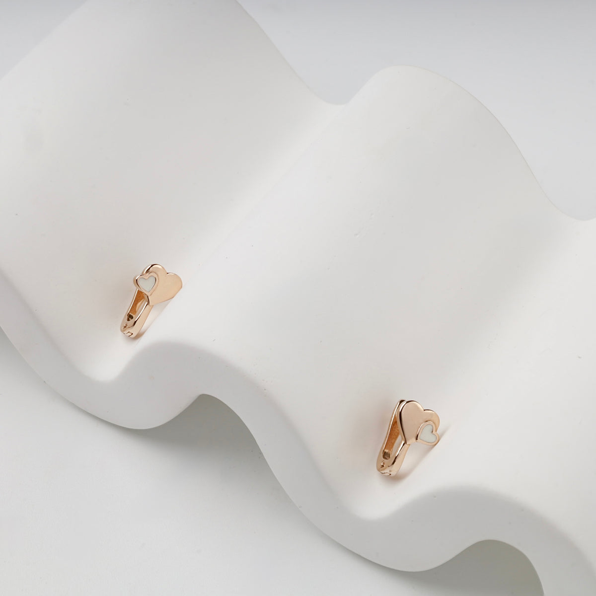Layered double heart earrings in Rose Gold 14K and white enamel
