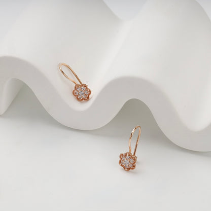 Cubic zirconia floral cluster earrings in Rose Gold 14K, close-up