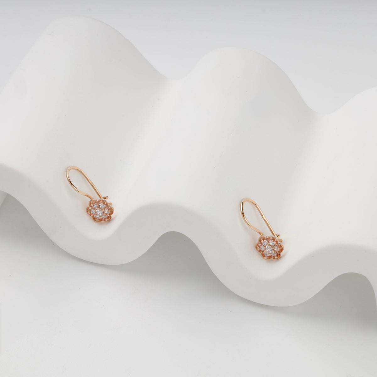 Rose Gold cubic zirconia flower hook kids earrings, pair view