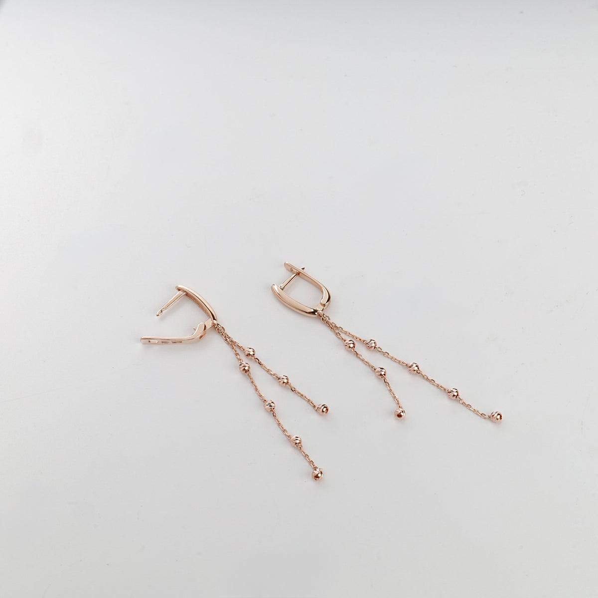 Rose gold 585 beaded chain drop earrings with English-lock fastenings