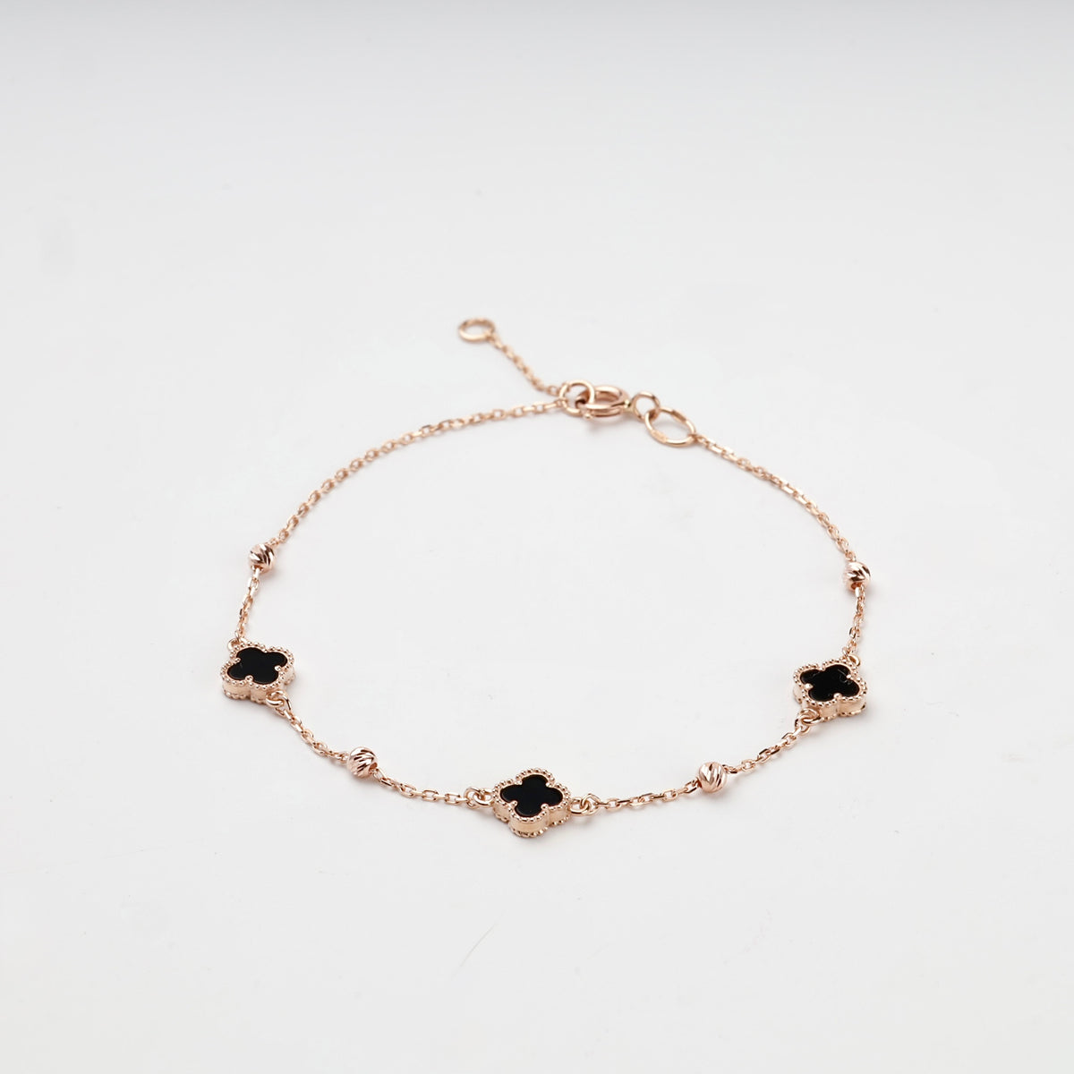 Rose gold 585 black onyx clover bracelet with spring-ring clasp