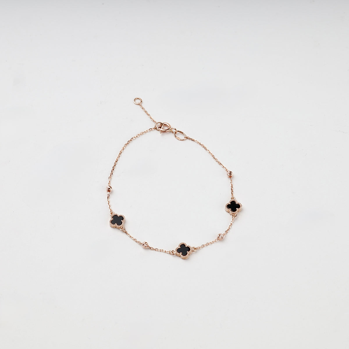Rose gold 585 black onyx clover chain bracelet, full view