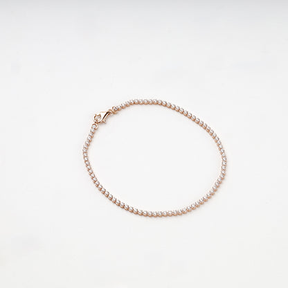 Rose gold tennis bracelet circular arrangement