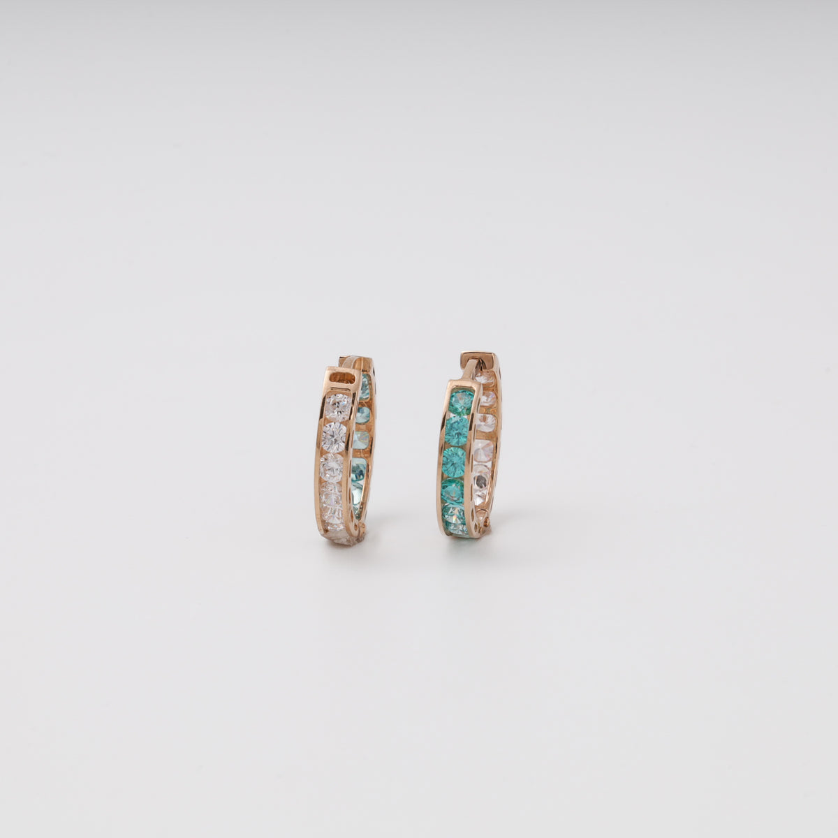 Rose gold mint and clear cubic zirconia huggie earrings — front view — Kabluchka