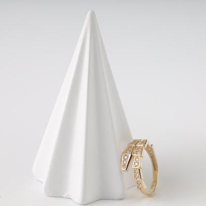 An elegant 14K Rose Gold ring shaped like a coiled snake with shimmering  inserts.