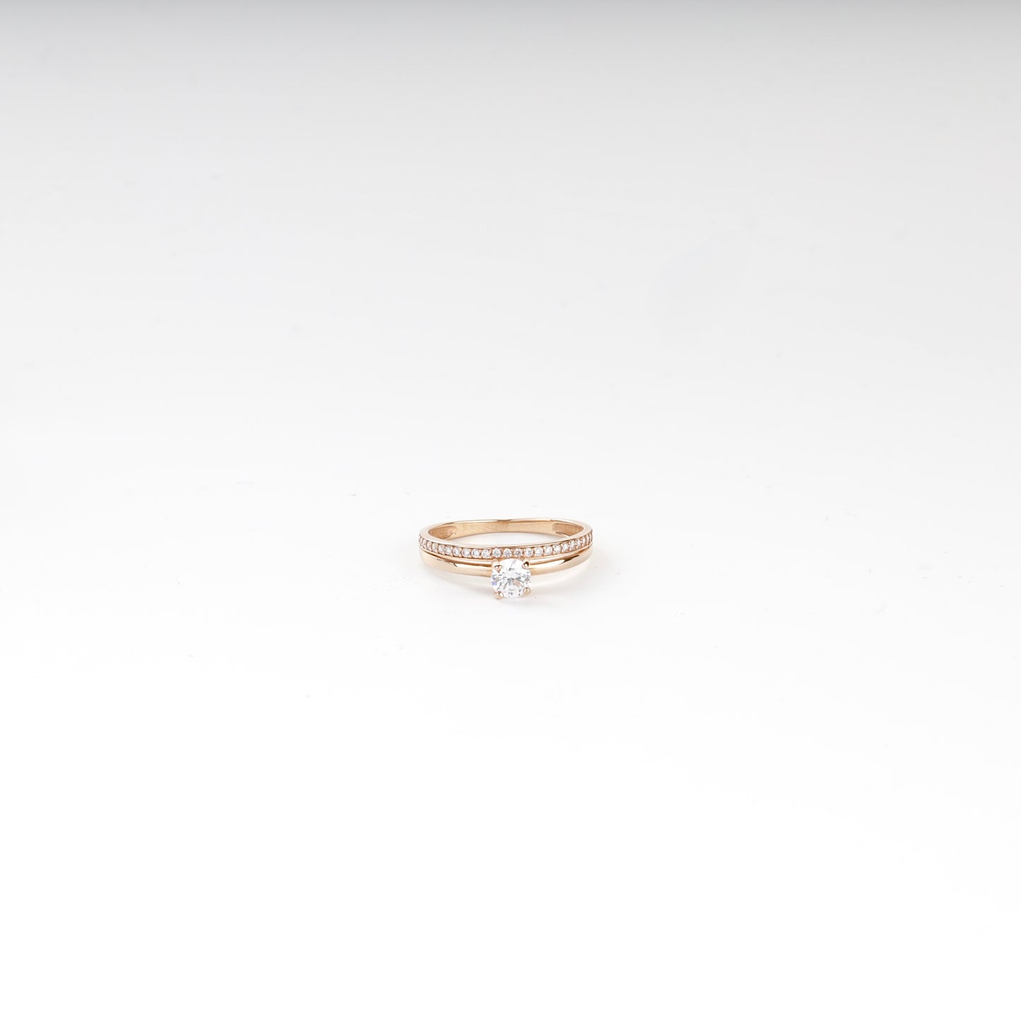 Rose Gold 14K (585) round cubic zirconia accent ring, product view 1 — Kabluchka