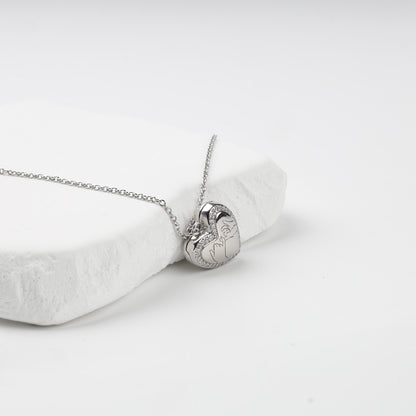 Pinky-promise engraving and cubic zirconia heart outline