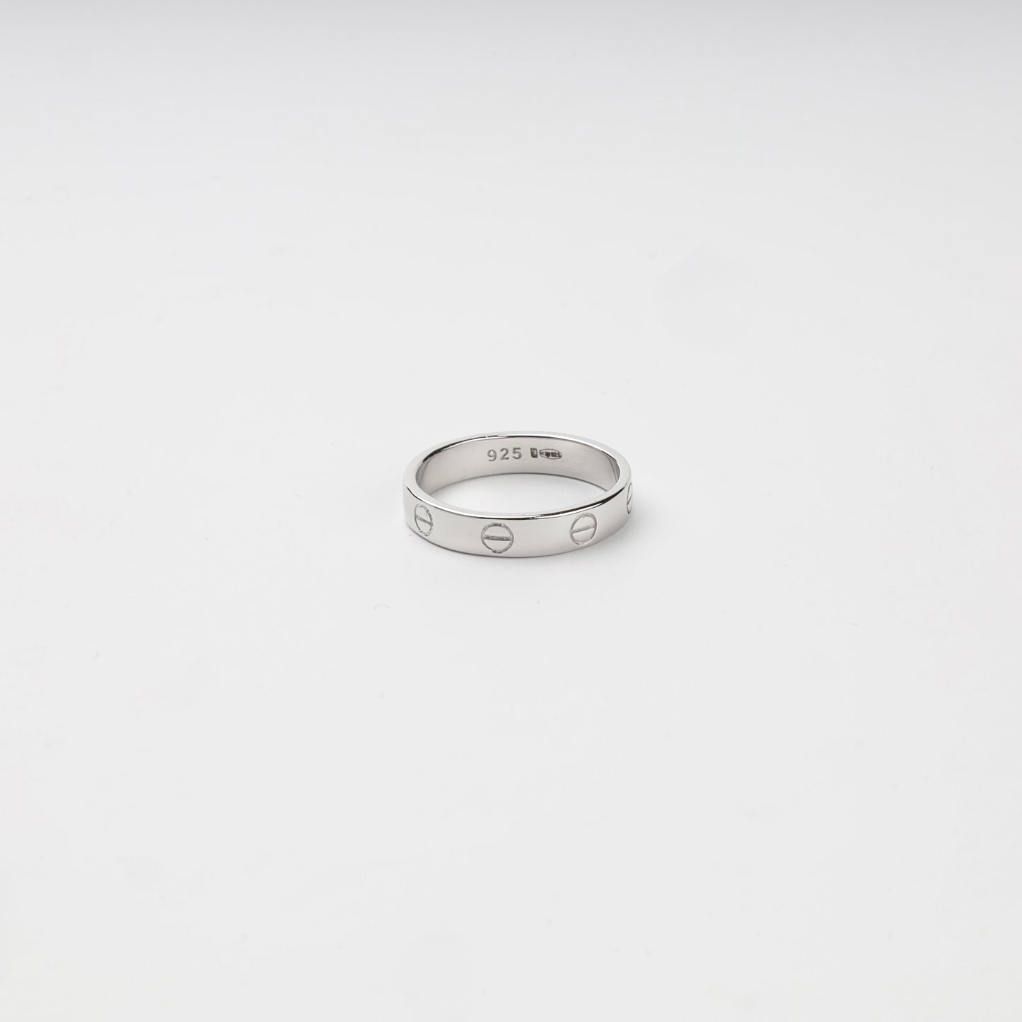 Rhodium-plated Silver 925 screw motif ring shown upright on a white background