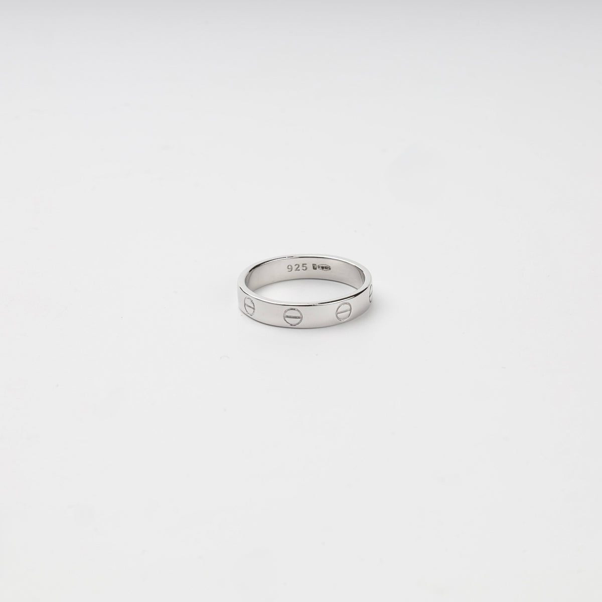 Rhodium-plated Silver 925 screw motif ring shown upright on a white background