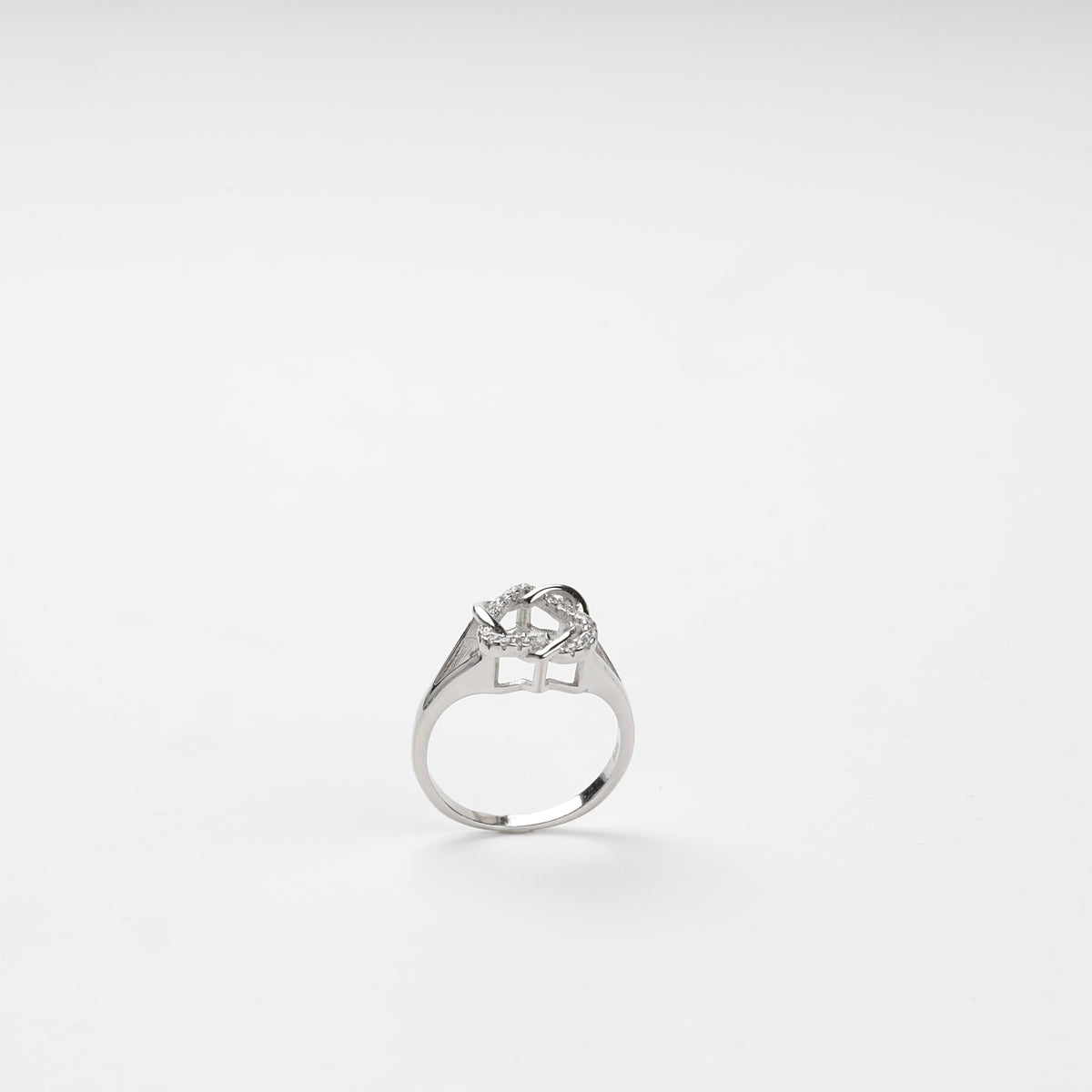 Back view of the polished ring shank and geometric openwork setting