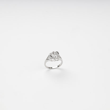 Rear angle of the rhodium-plated ring showing its openwork gallery and clear stones
