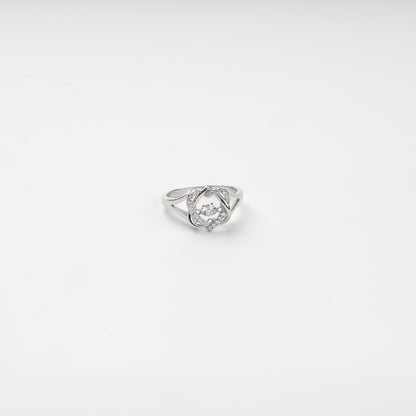 Silver 925 cubic zirconia ring with a moving center stone on a white background