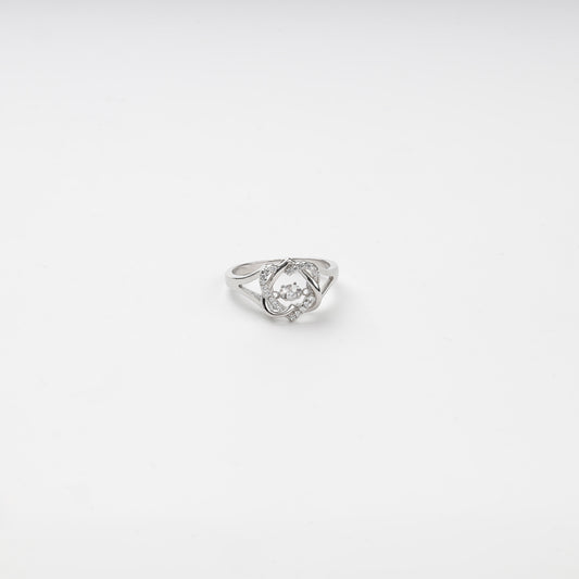 Silver 925 cubic zirconia ring with a moving center stone on a white background