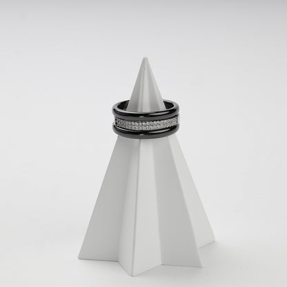 Black ceramic and cubic zirconia ring set shown in an alternate stacked arrangement