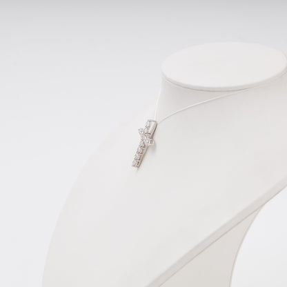 Diamond cross pendant side profile on bust display - Kabluchka