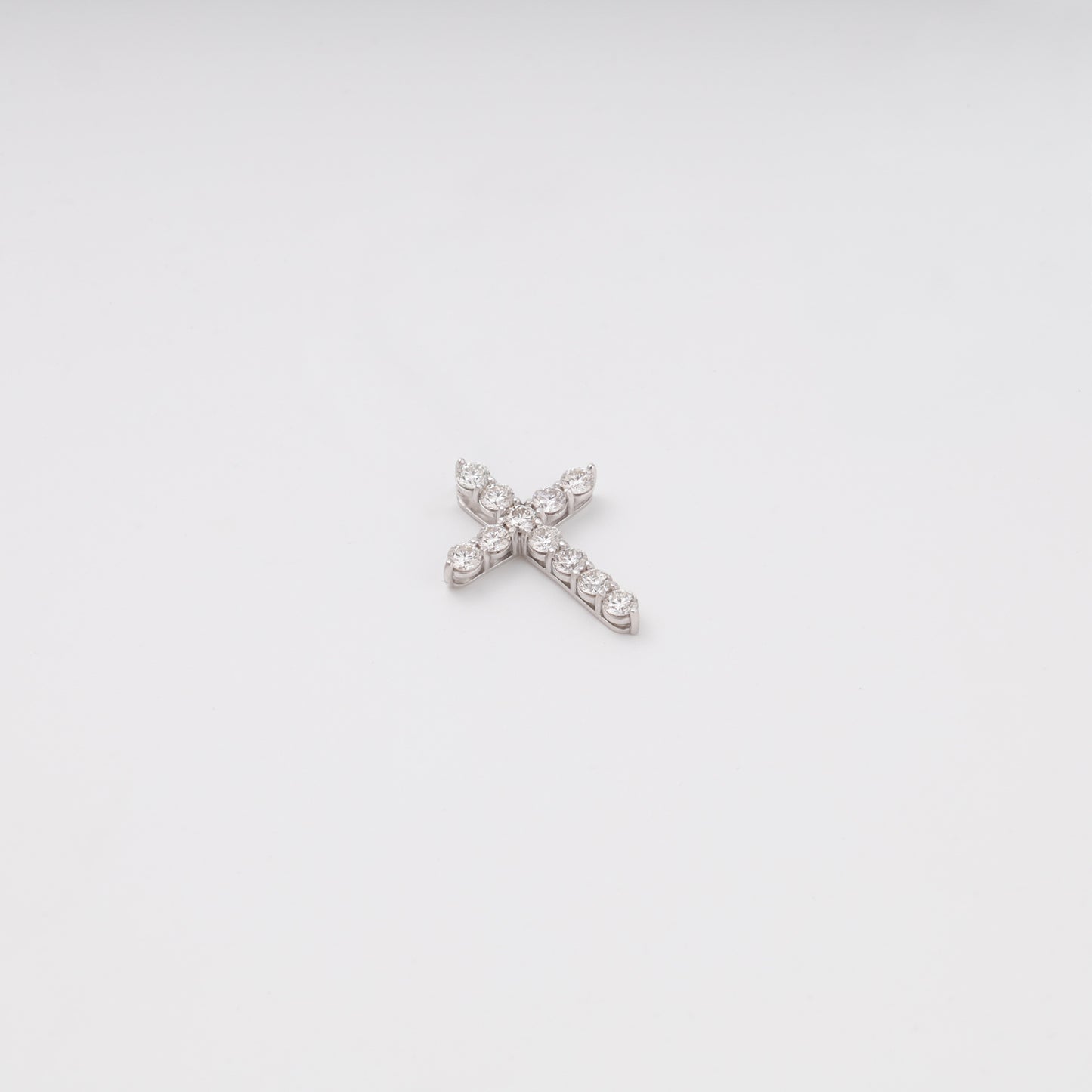 Diamond cross pendant flat lay showing 11 brilliant stones - Kabluchka store