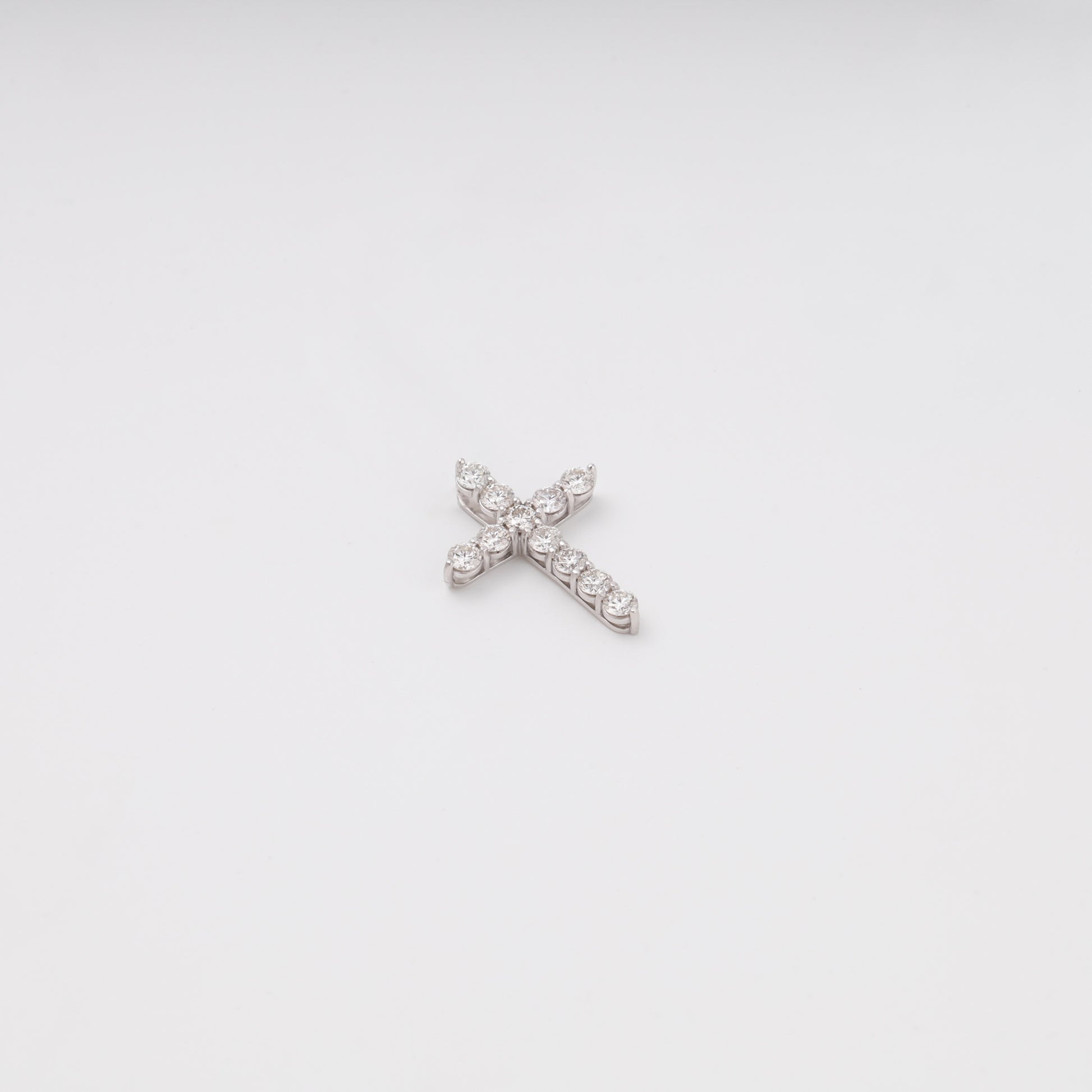 Diamond cross pendant flat lay showing 11 brilliant stones - Kabluchka store