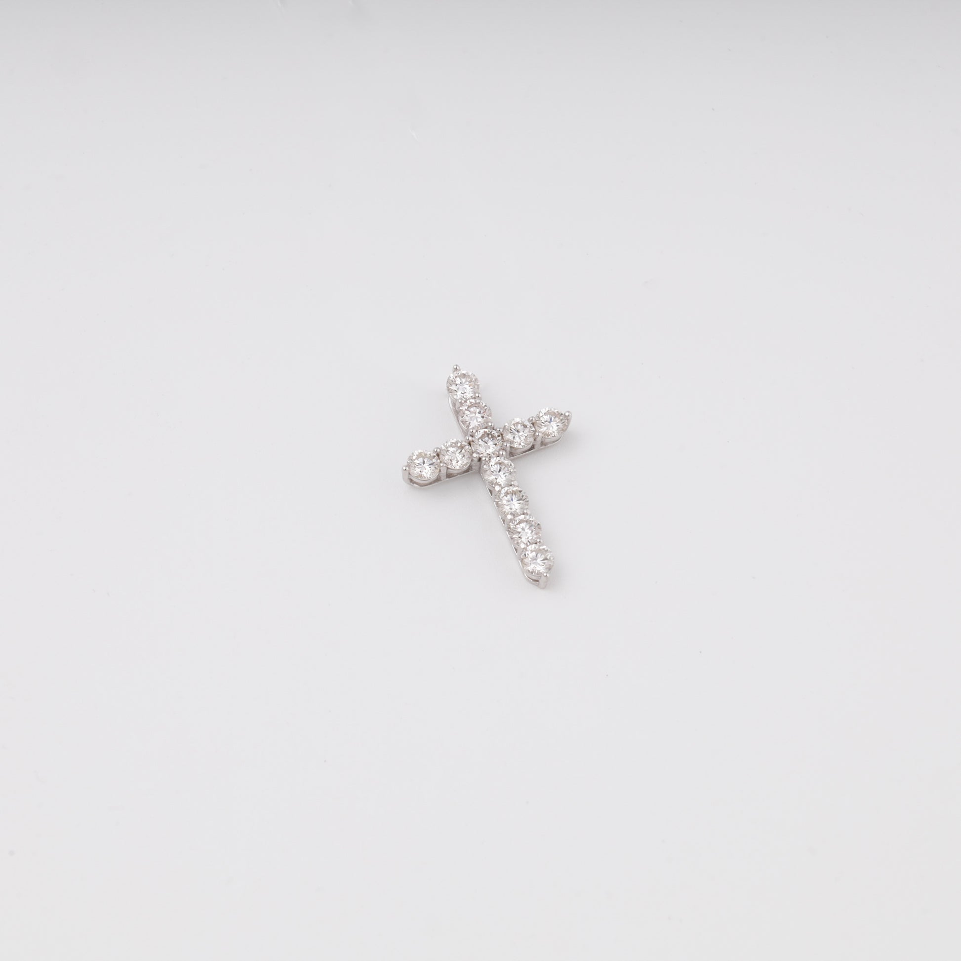 White gold diamond cross pendant flat lay top view showing 11 stones - Kabluchka