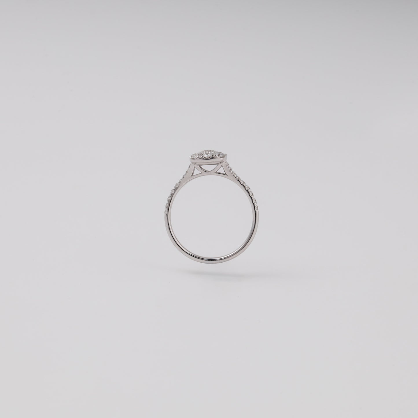 White gold diamond cluster ring back profile showing cathedral gallery - Kabluchka