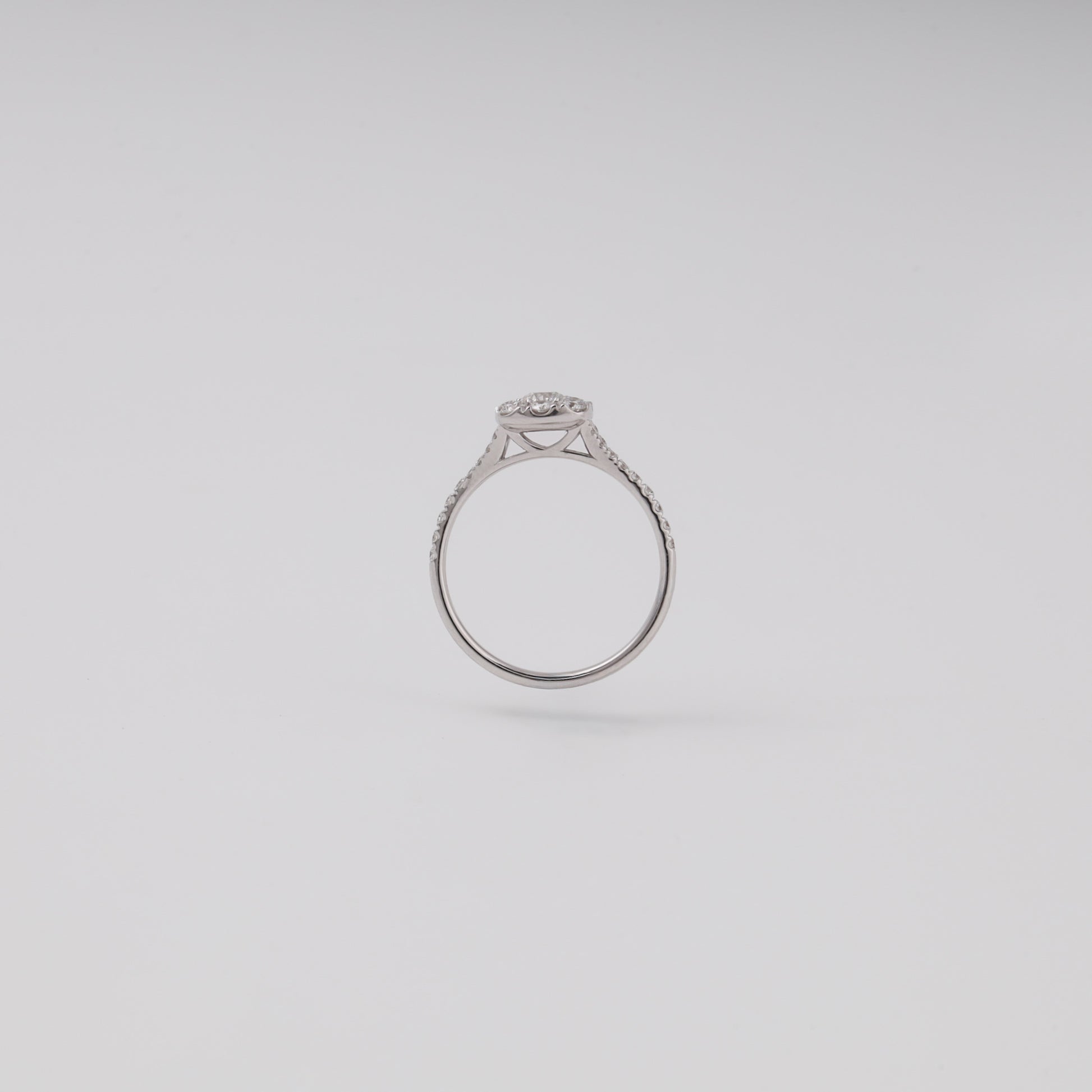 White gold diamond cluster ring back profile showing cathedral gallery - Kabluchka