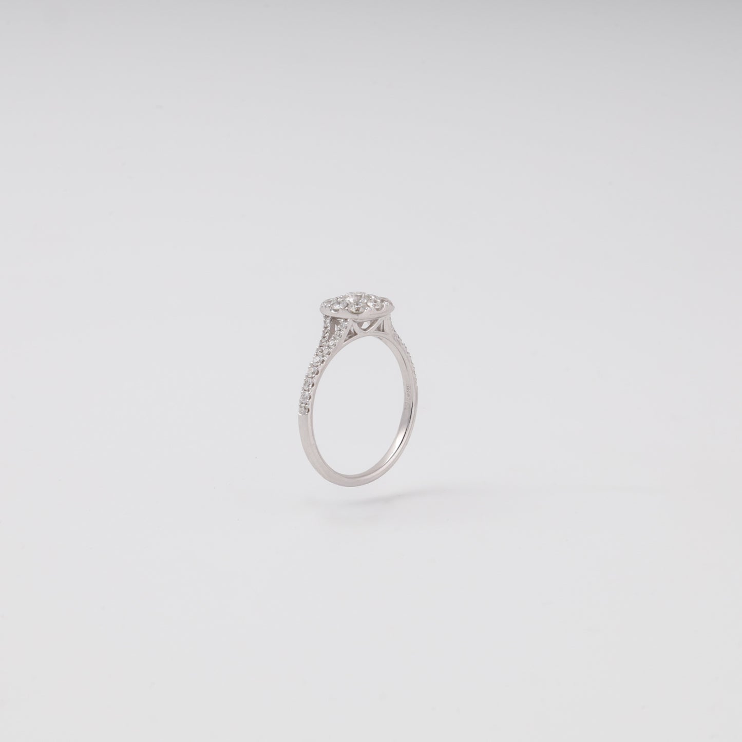 Diamond cluster ring side profile showing pave split shank - Kabluchka