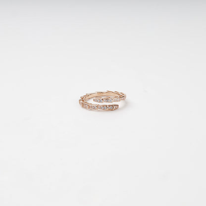 Cubic zirconia segmented wrap ring, angled view — Kabluchka