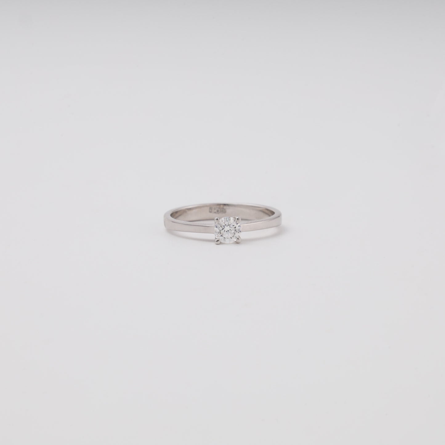 Solitaire diamond engagement ring 14K white gold front view - Kabluchka jewelry