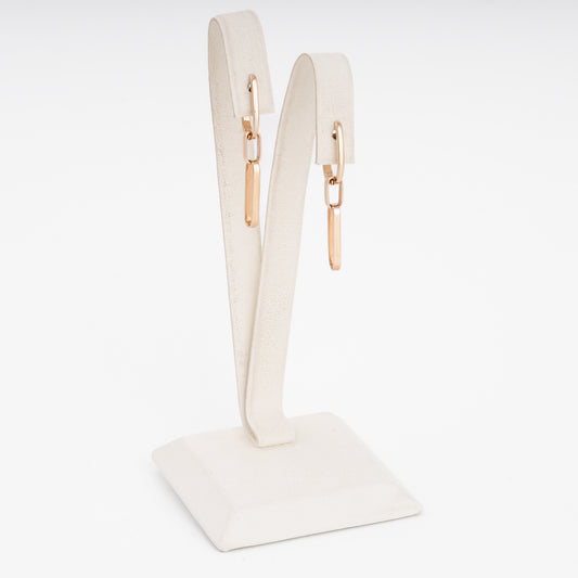 14k gold bar drop earrings on a white stand, minimalist dangle Ukrainian Jewelry for women, gold earrings for everyday wear.